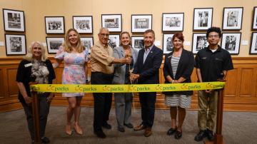 Ribbon cutting for The Other Side of Memory exhibit at the Old Orange County Courthouse.