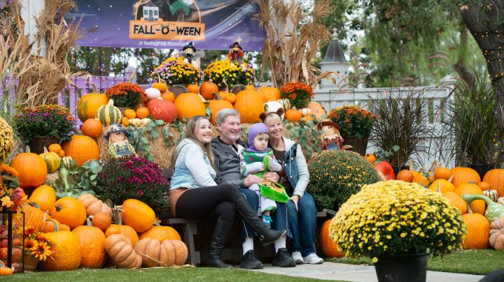 Families take a photo at Fall-O-Ween 