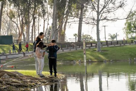 Family fishing at fishing derby.